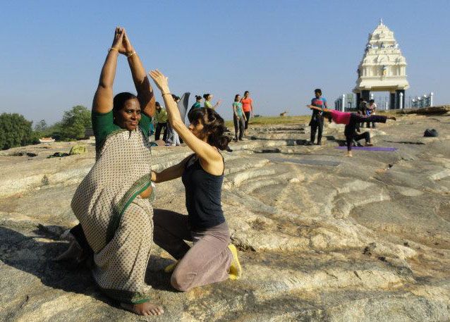 Erica teaching yoga in Bangalore