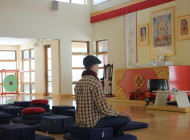 meditator on cushion