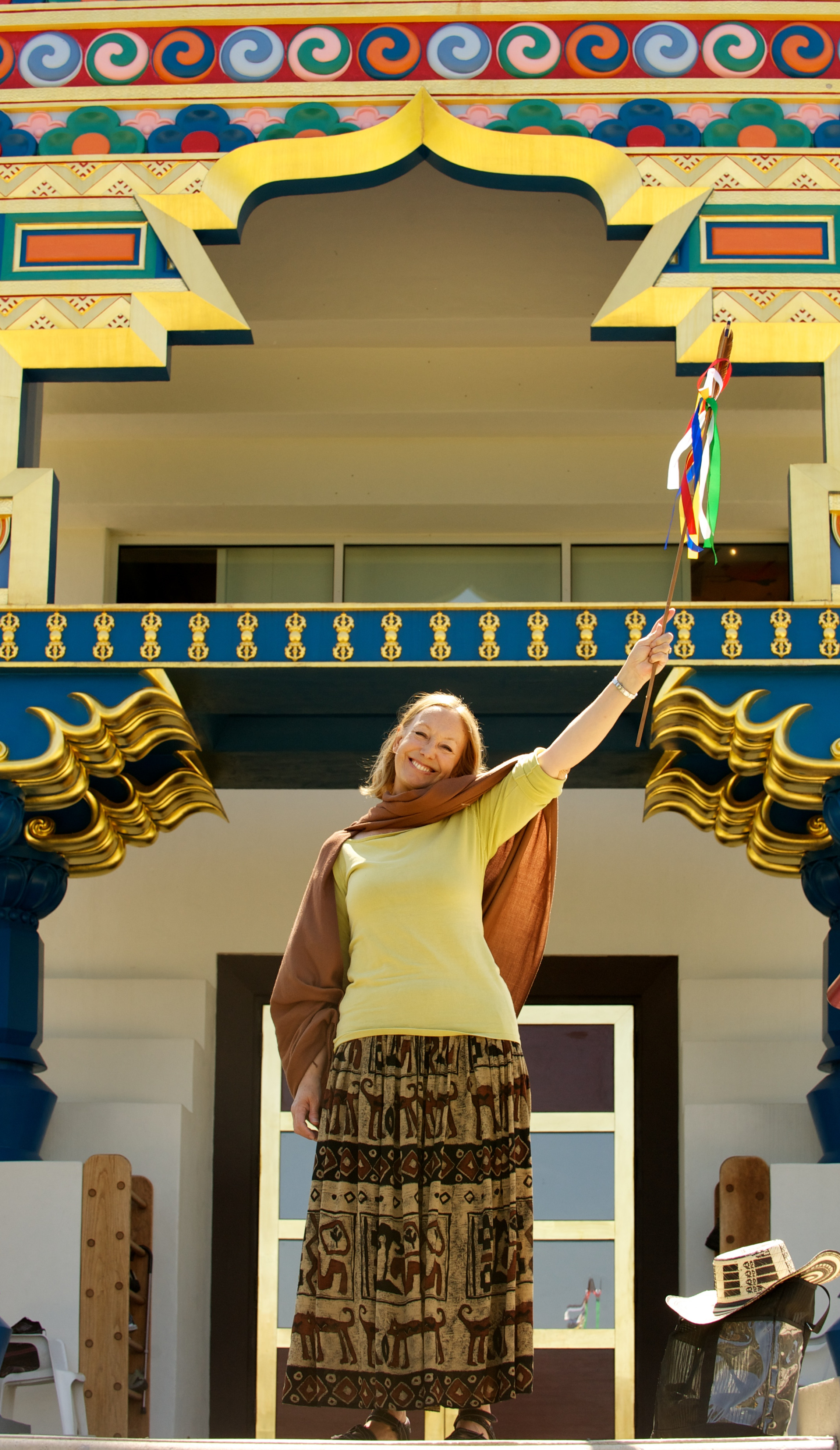 Smiling Woman Holding Banner