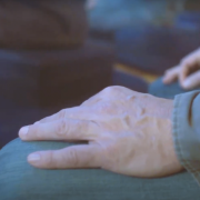 Hands resting on thighs during meditation